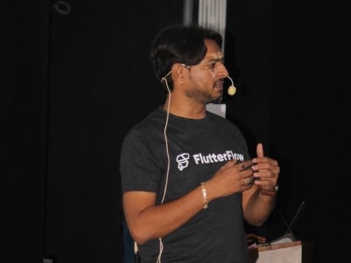 Jaydeep Adesara speaking at a developer community event