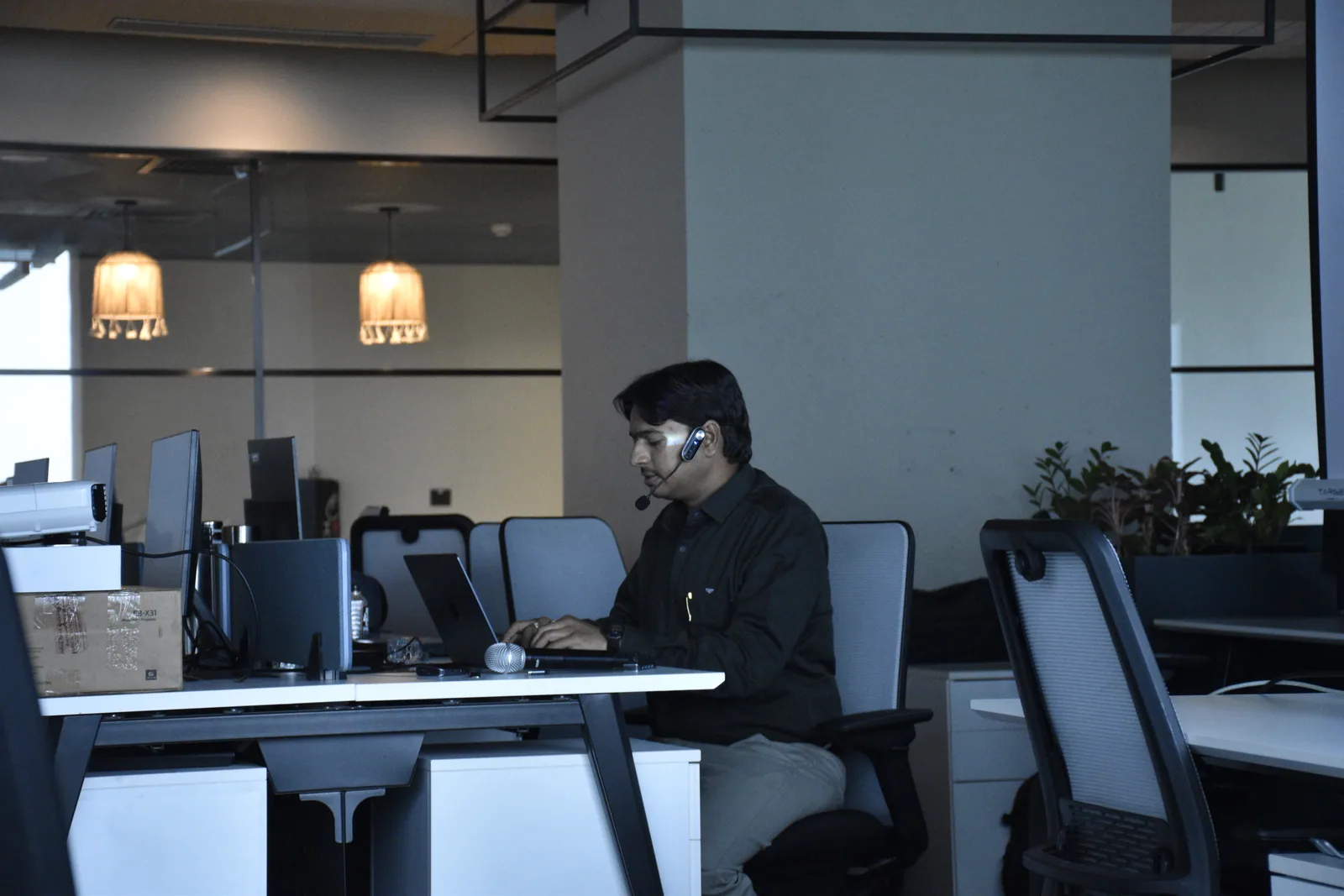 Jaydeep Adesara preparing a live technical demonstration at a laptop